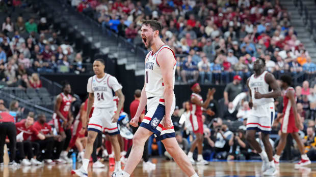 UConn Huskies forward Alex Karaban reacts after a play.